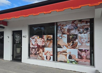 K Day Spa exterior featuring wellness posters, Naples, Florida, US.