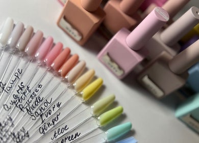 Nail polish shades at Khristi Nails, London, England, GB showcasing vibrant colors and quality finishes.