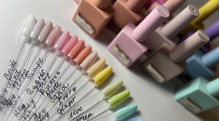 Nail polish shades at Khristi Nails, London, England, GB showcasing vibrant colors and quality finishes.