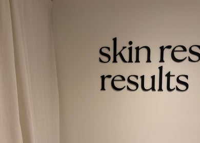 Wall sign at Emily - Skin Rest Results, Sheffield, England, GB, featuring 'skin rest results' text.