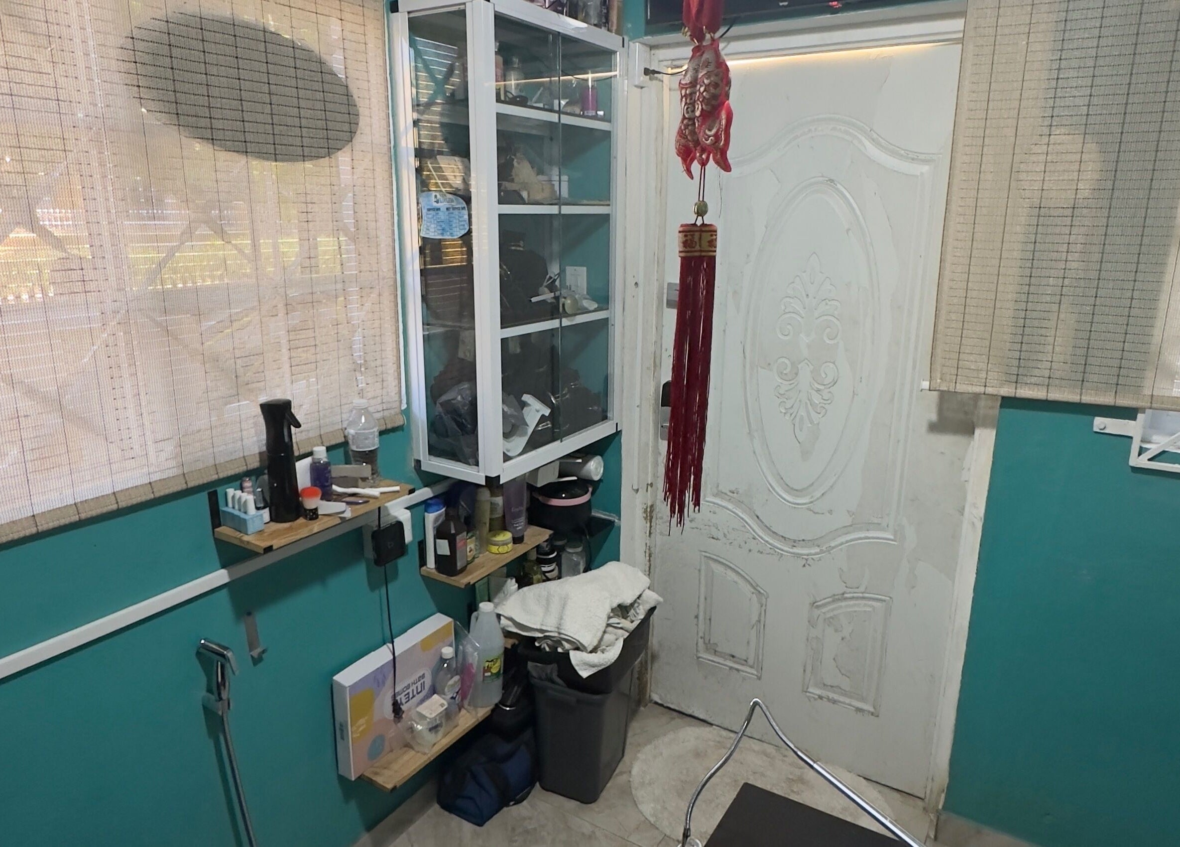 A calm beauty space at JPOSH, Portmore, St. Catherine Parish, JM with organized shelves and soothing decor.