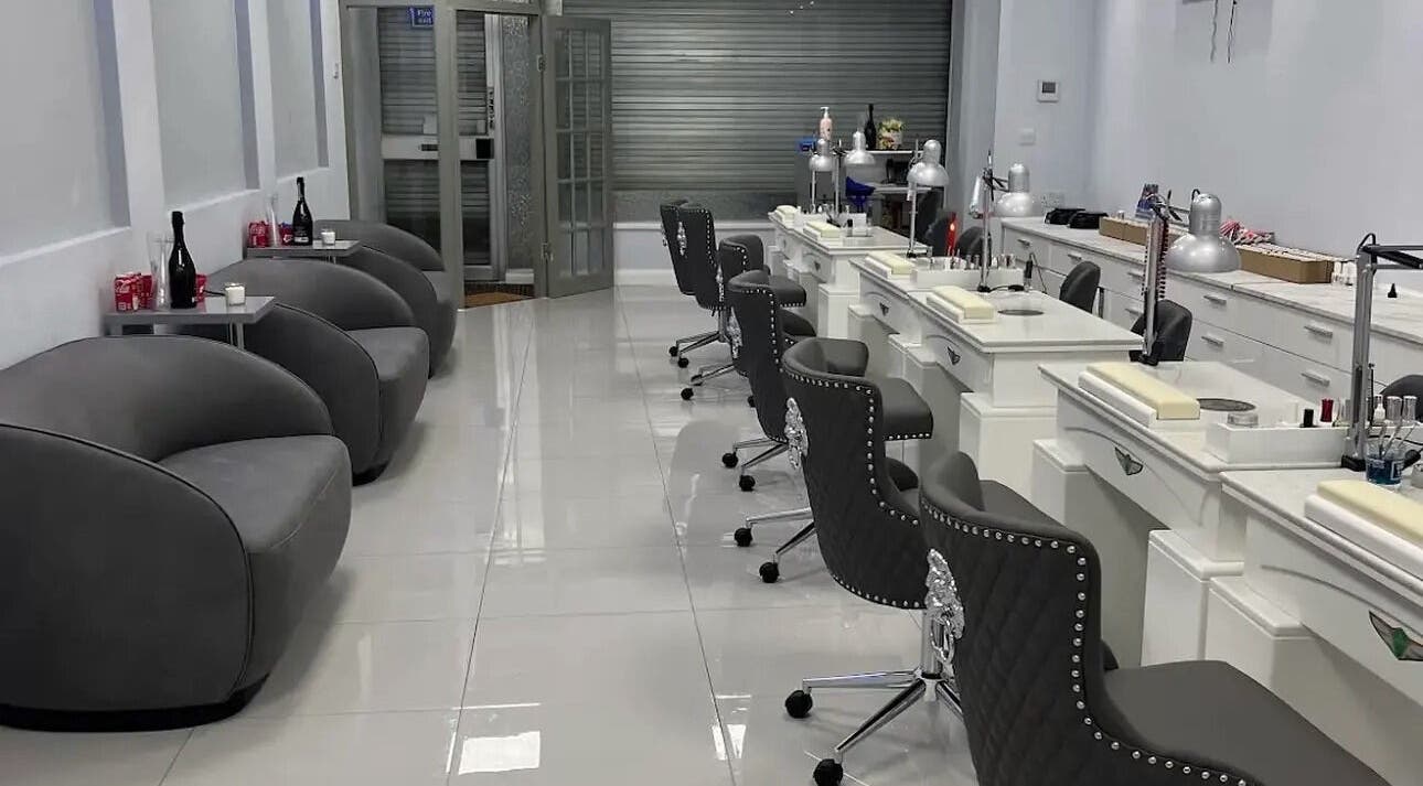 Stylish interior of DNV NAILS SALON in Barnsley, England, GB showcasing modern nail station and comfy seating.