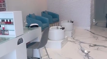 Modern pedicure and manicure station at Bella’s Image Salon, Miami Gardens, Florida, with stylish seating.