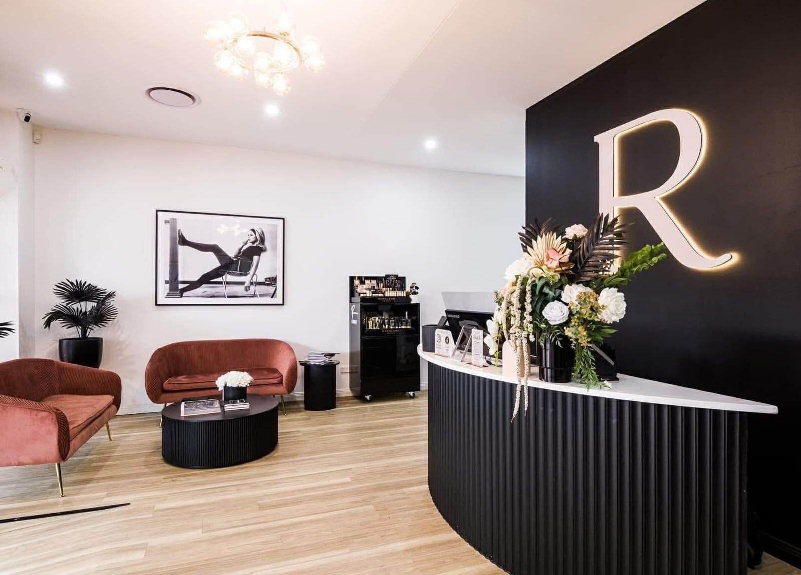 Elegant interior of Runway, Tamworth, New South Wales, AU, featuring stylish seating and floral decor.