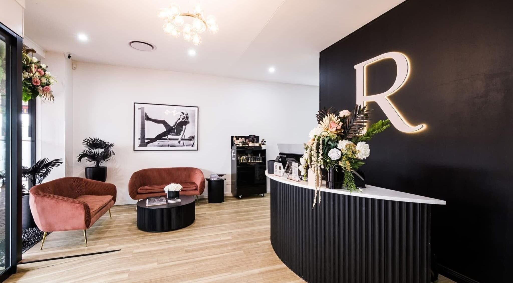 Elegant interior of Runway, Tamworth, New South Wales, AU, featuring stylish seating and floral decor.