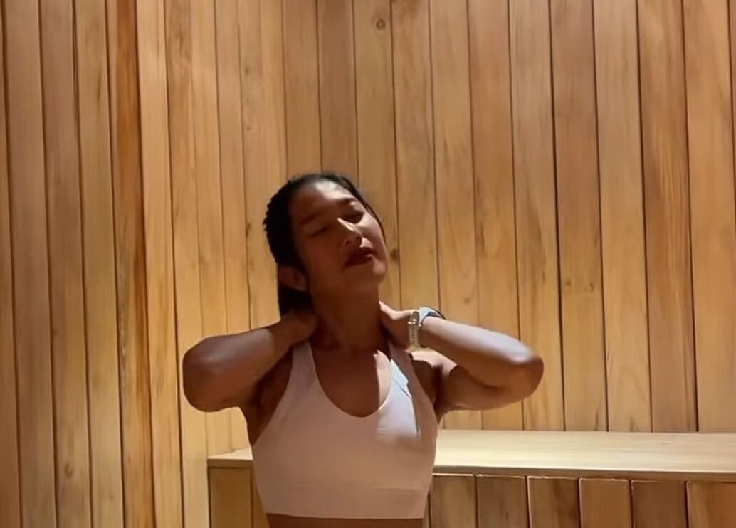 Relaxing spa experience at KU Salon & Spa, Nusa Tenggara Barat, ID, with woman enjoying sauna.