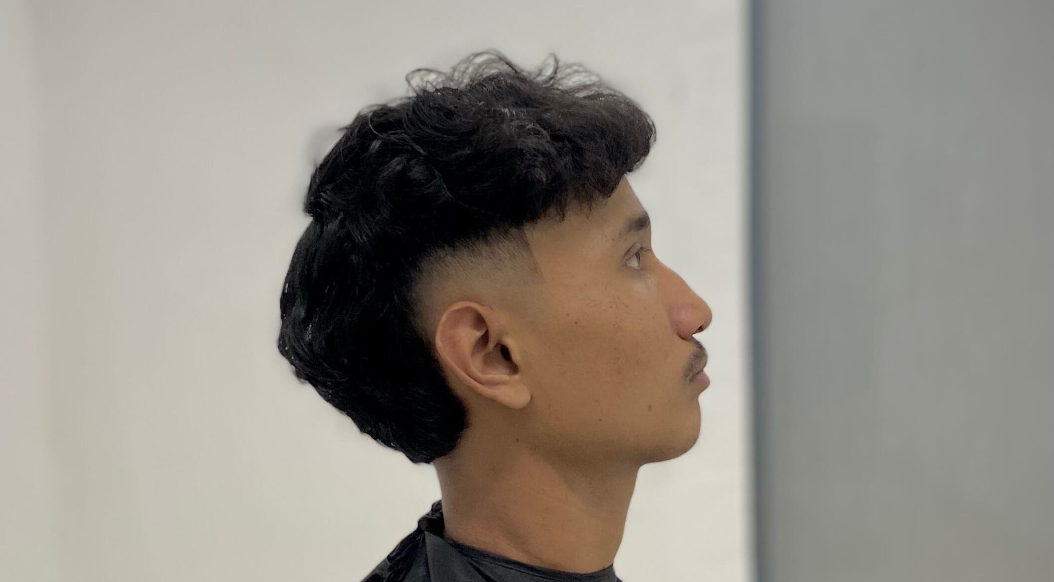 Side profile of a stylish haircut at Tokbarbero, Sepang, Selangor, MY.
