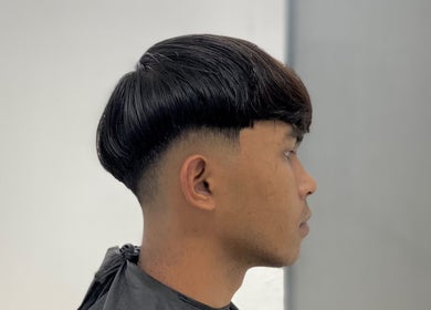 Side view of a modern haircut at Tokbarbero, Sepang, Selangor, MY showcasing clean lines and style.