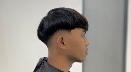 Side view of a modern haircut at Tokbarbero, Sepang, Selangor, MY showcasing clean lines and style.