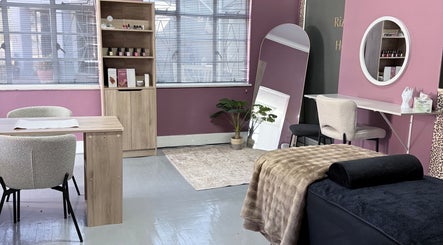 Elegant beauty room at RIZE - The Brand in Bloemfontein, Free State, ZA, featuring nail and massage areas.