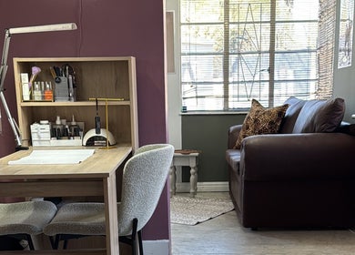 Elegant beauty workspace at RIZE - The Brand, Bloemfontein, Free State, ZA with a comfy seating area.