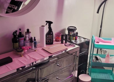 Tattoo workspace at Willow Ink, York, England, GB featuring tools and inks for creative designs.