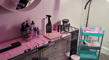 Tattoo workspace at Willow Ink, York, England, GB featuring tools and inks for creative designs.