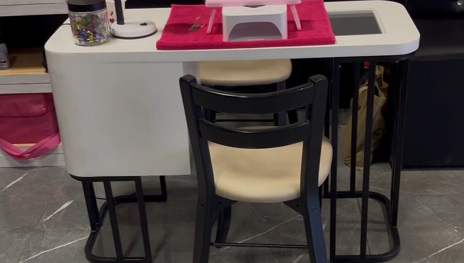 Elegant nail station at Royal Nails, Soweto, Gauteng, ZA, featuring a sleek design with comfortable seating.