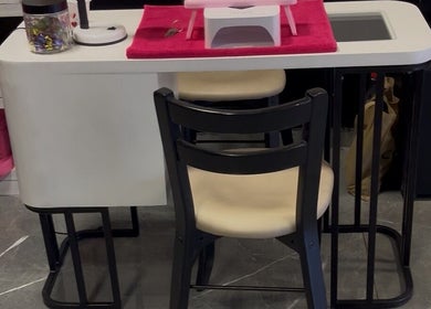 Elegant nail station at Royal Nails, Soweto, Gauteng, ZA, featuring a sleek design with comfortable seating.