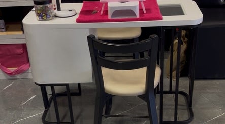 Elegant nail station at Royal Nails, Soweto, Gauteng, ZA, featuring a sleek design with comfortable seating.
