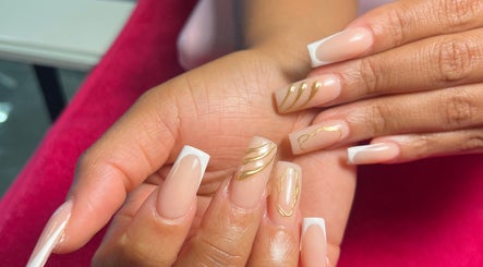 Elegant nail art with gold designs at Royal Nails, Soweto, Gauteng, ZA. Perfect for stylish manicures.