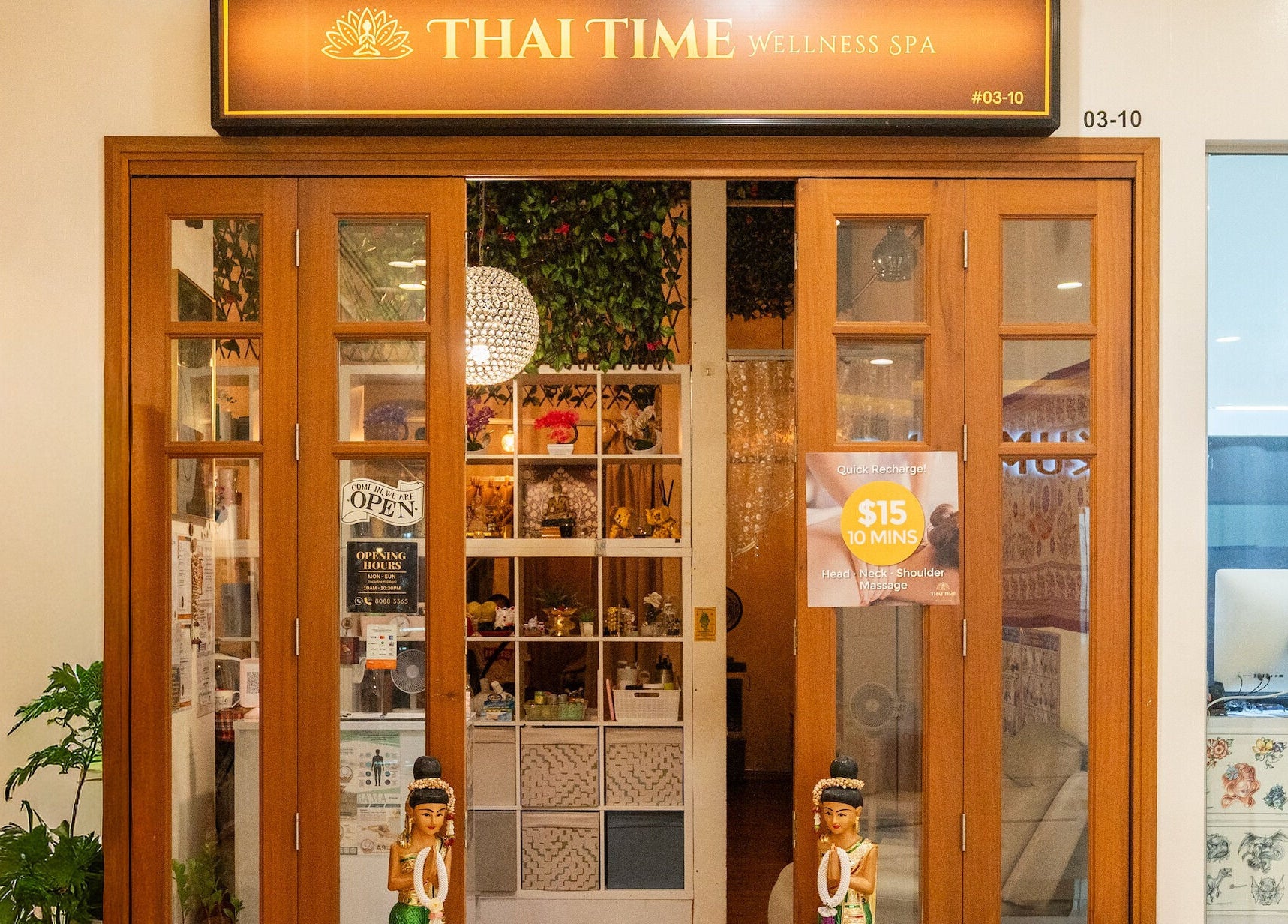 Entrance to Thai Time Wellness Spa in Singapore, SG with elegant decor and welcoming ambiance.