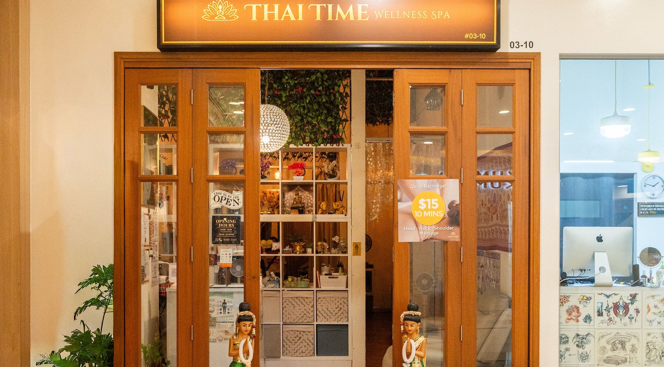 Entrance to Thai Time Wellness Spa in Singapore, SG with elegant decor and welcoming ambiance.