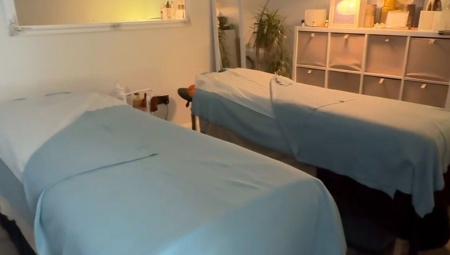 Cozy therapy room at Irina Zukh at Alprem in Waterford, County Waterford, IE, features two massage tables.