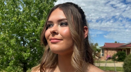 Woman with glowing makeup at Illustrated by KC, Mount Austin, New South Wales, AU.