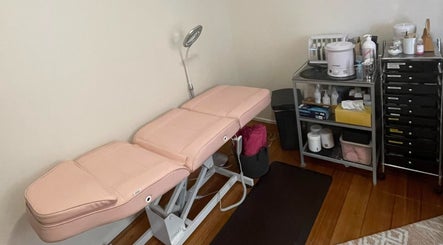 Treatment room at Velvet Waxing and Beauty, Melbourne, Victoria, AU with a waxing bed and supplies.