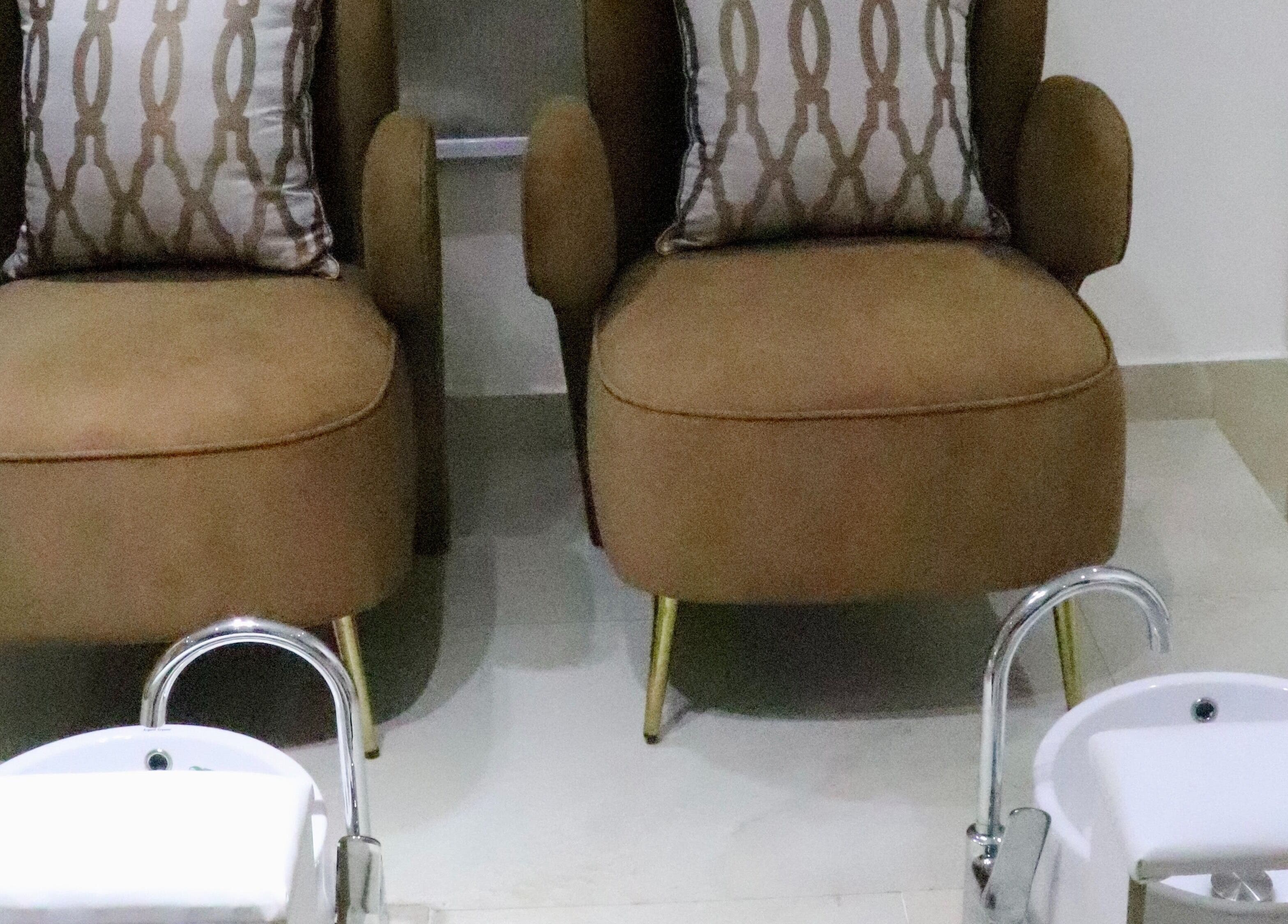 Plush pedicure chairs at SHE Beauty Studio, Lagos, Lagos, NG offer premium comfort and style.