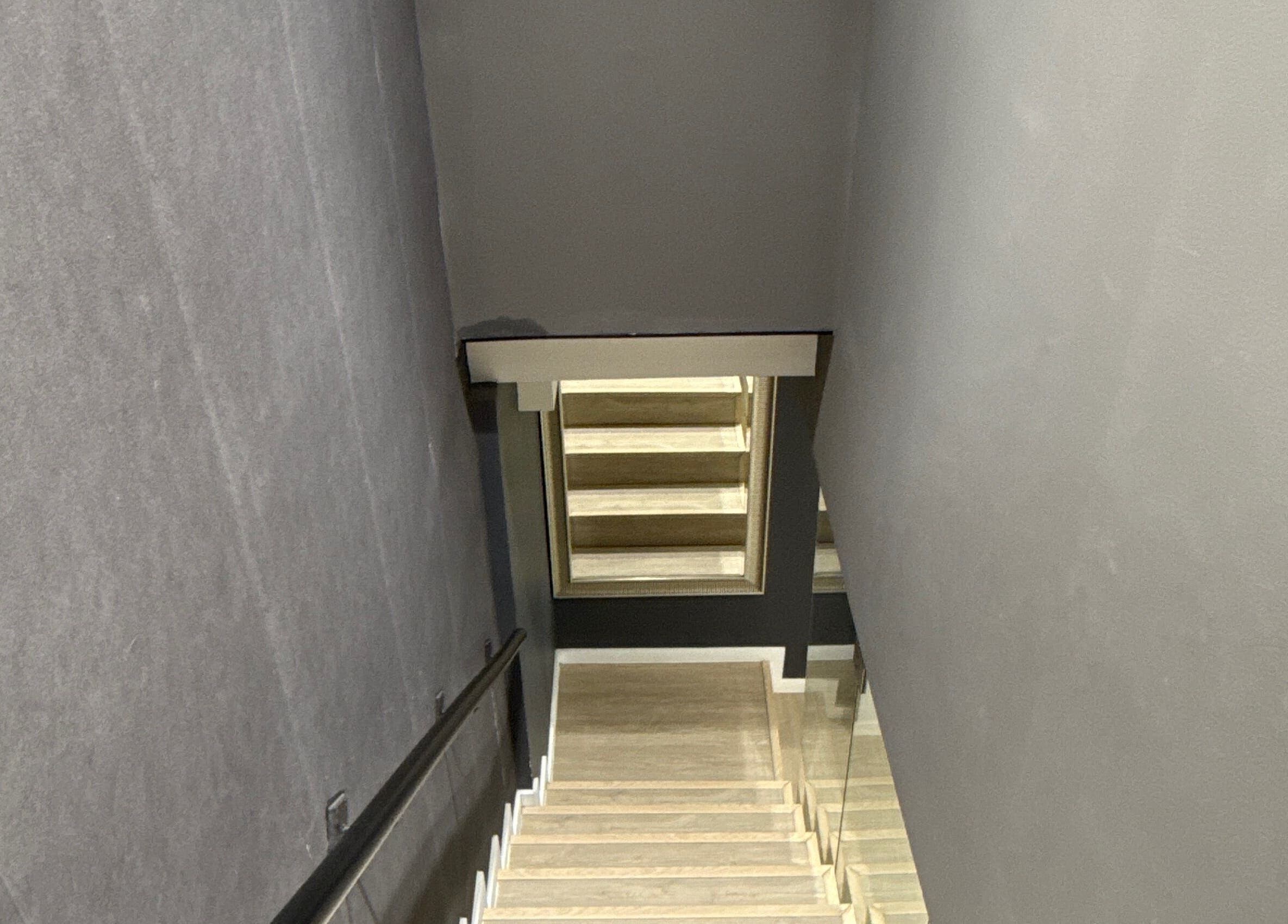 Wooden staircase leading to Ton Silva Hair Concept in Parede, Lisboa, PT.