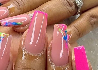 Stylish pink nails with neon accents at Tertia’s nail bar in Johannesburg, Gauteng, ZA.