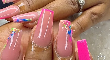 Stylish pink nails with neon accents at Tertia’s nail bar in Johannesburg, Gauteng, ZA.