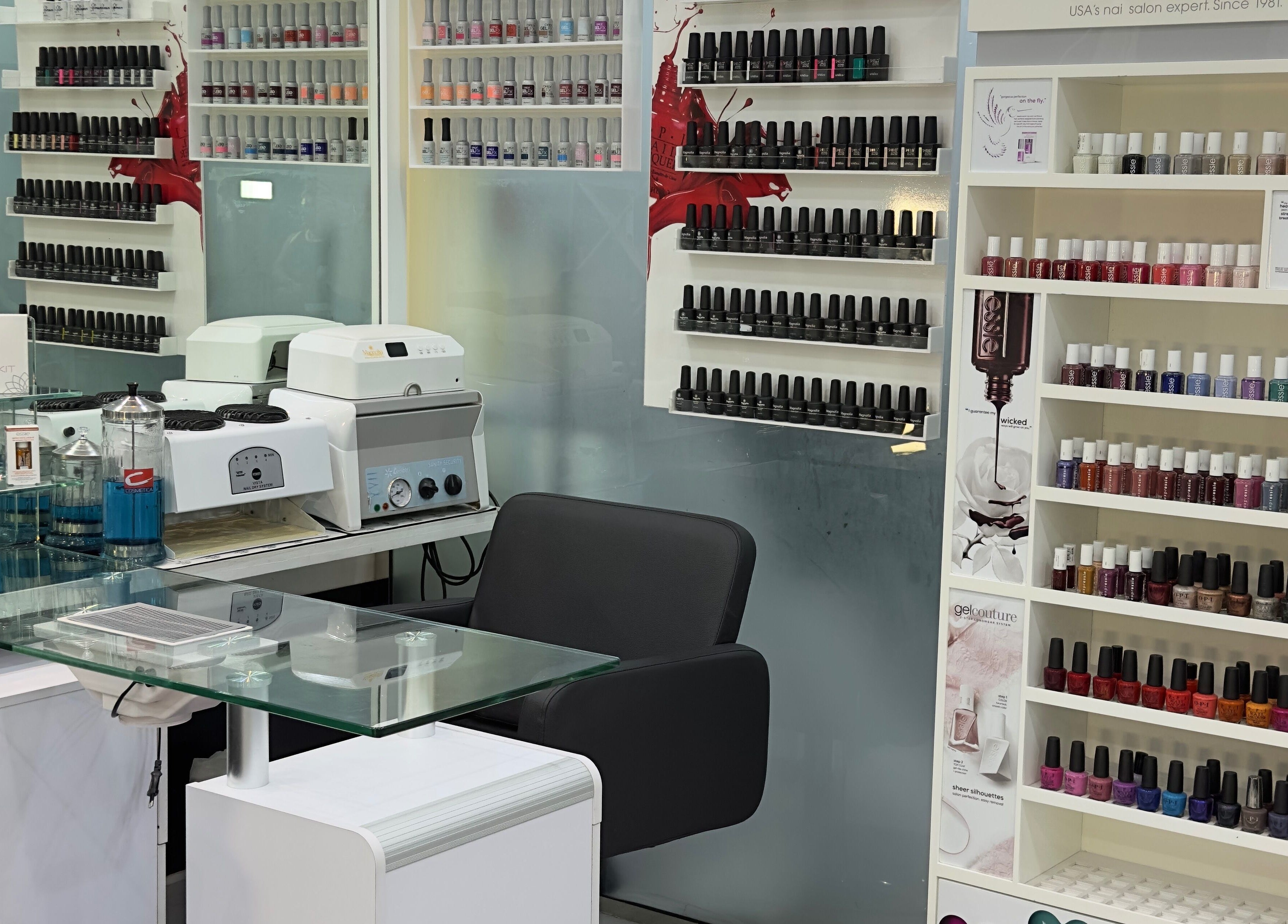 Nail polish display at Lya Arabi Beauty Salon, Dubai, AE. Elegant setup for manicure enthusiasts.