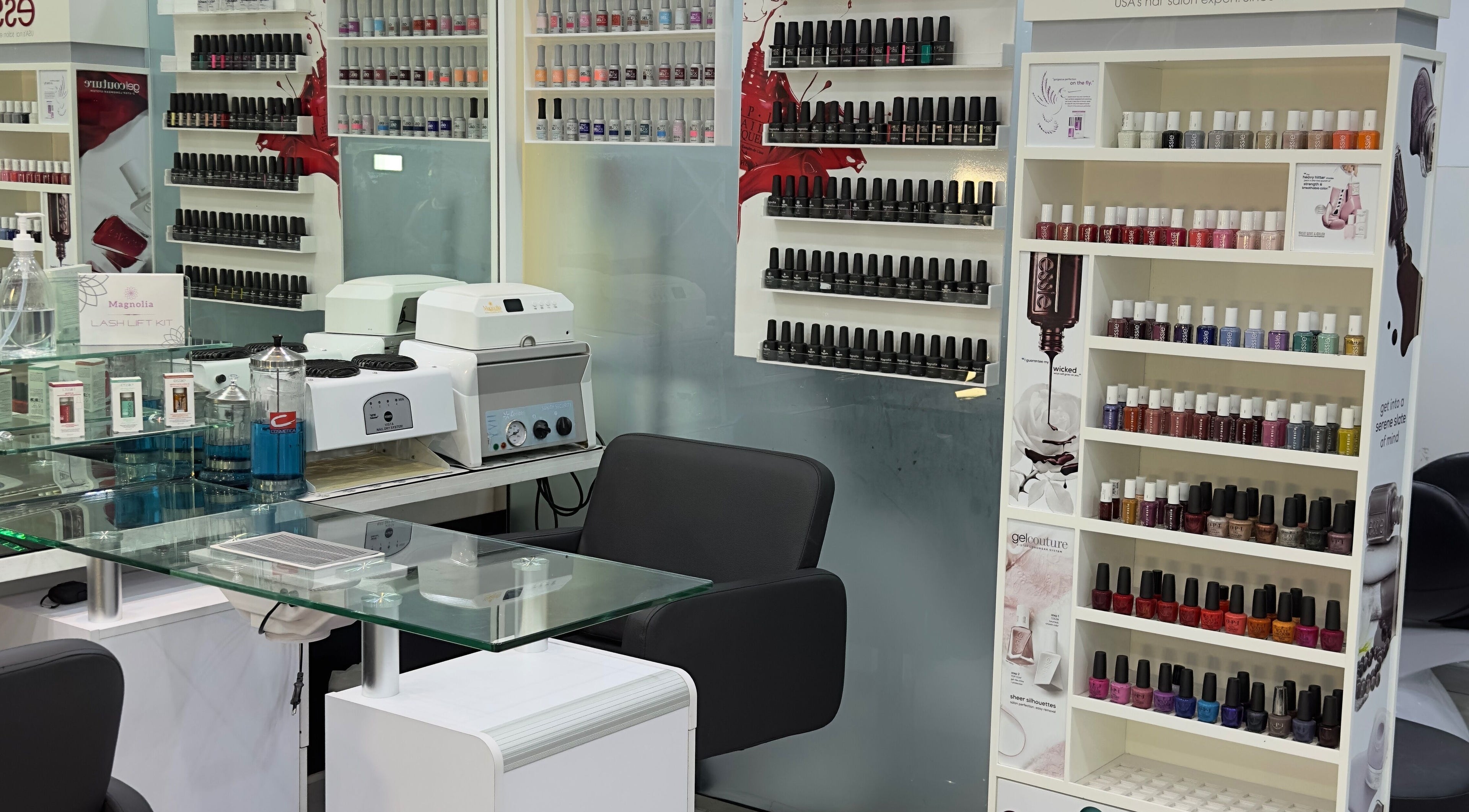 Nail polish display at Lya Arabi Beauty Salon, Dubai, AE. Elegant setup for manicure enthusiasts.