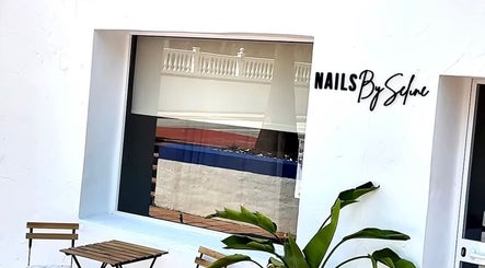 Exterior of Arabella lashes calahonda, Mijas, Andalucía, ES with stylish decor and 'Nails By Selene' signage.