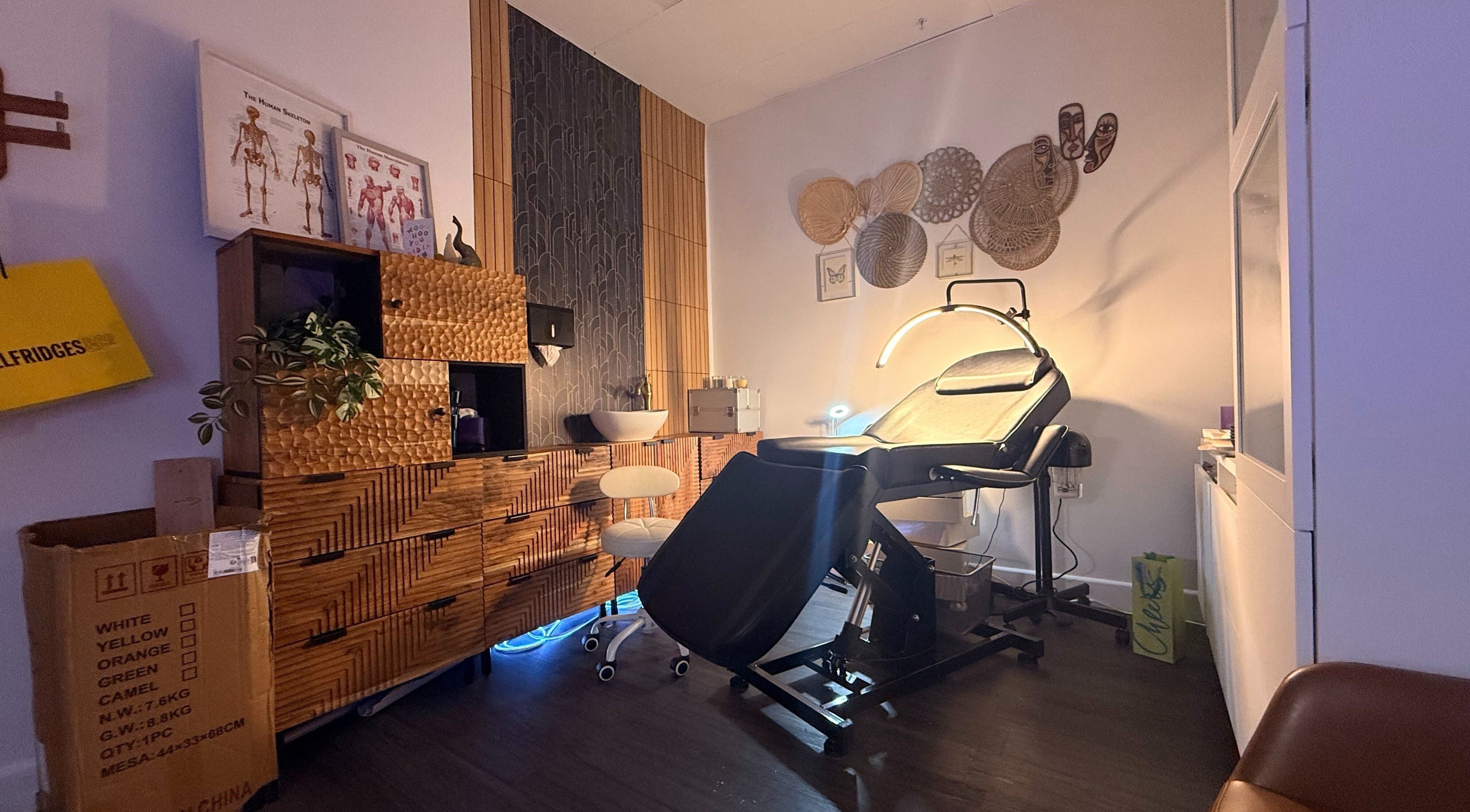 Calm treatment room at Disa Aesthetics, beautifully styled with modern furniture in Manchester, England, GB.