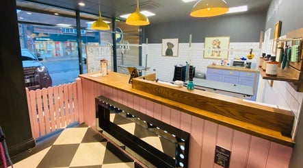 Inside view of Paws N' Bubbles grooming salon in Makati City, Metro Manila, PH, featuring stylish decor.