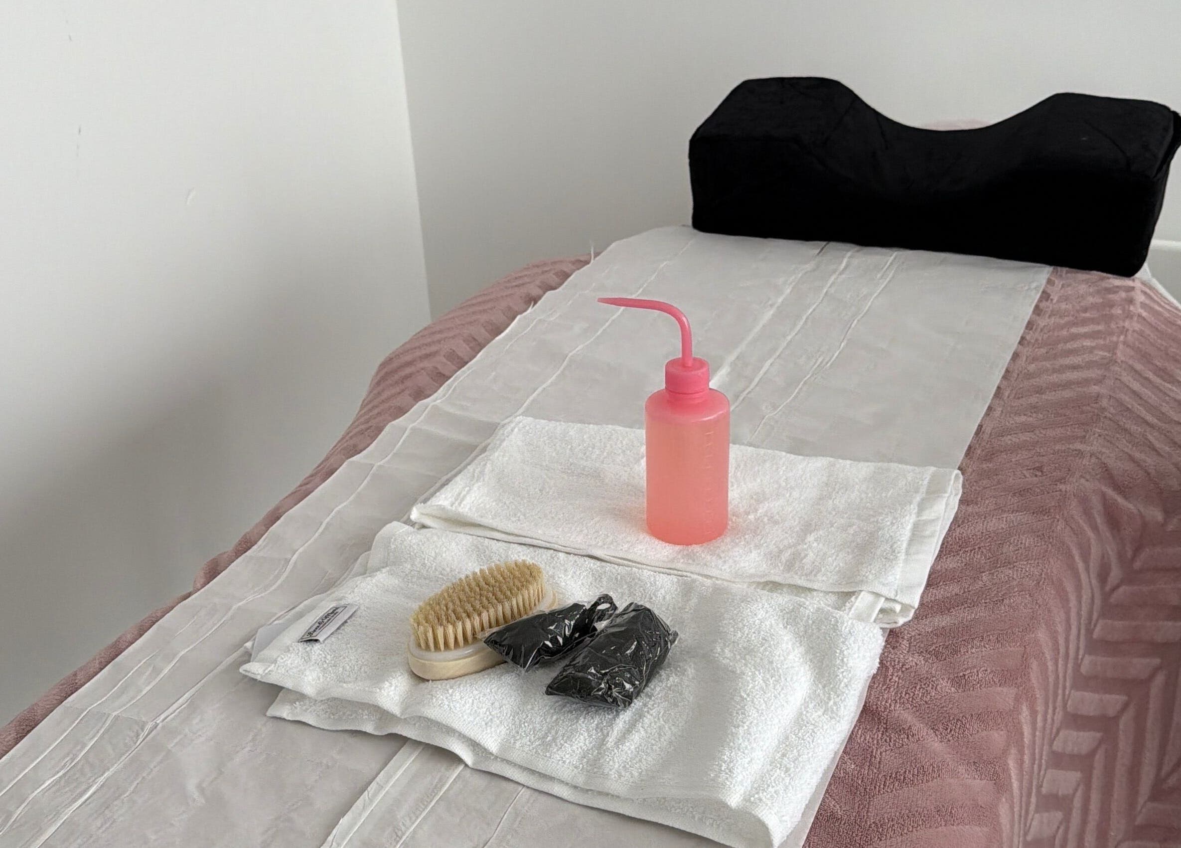 Treatment table setup at sol.lymphatic, Salford, England, GB, ready for a relaxing session.