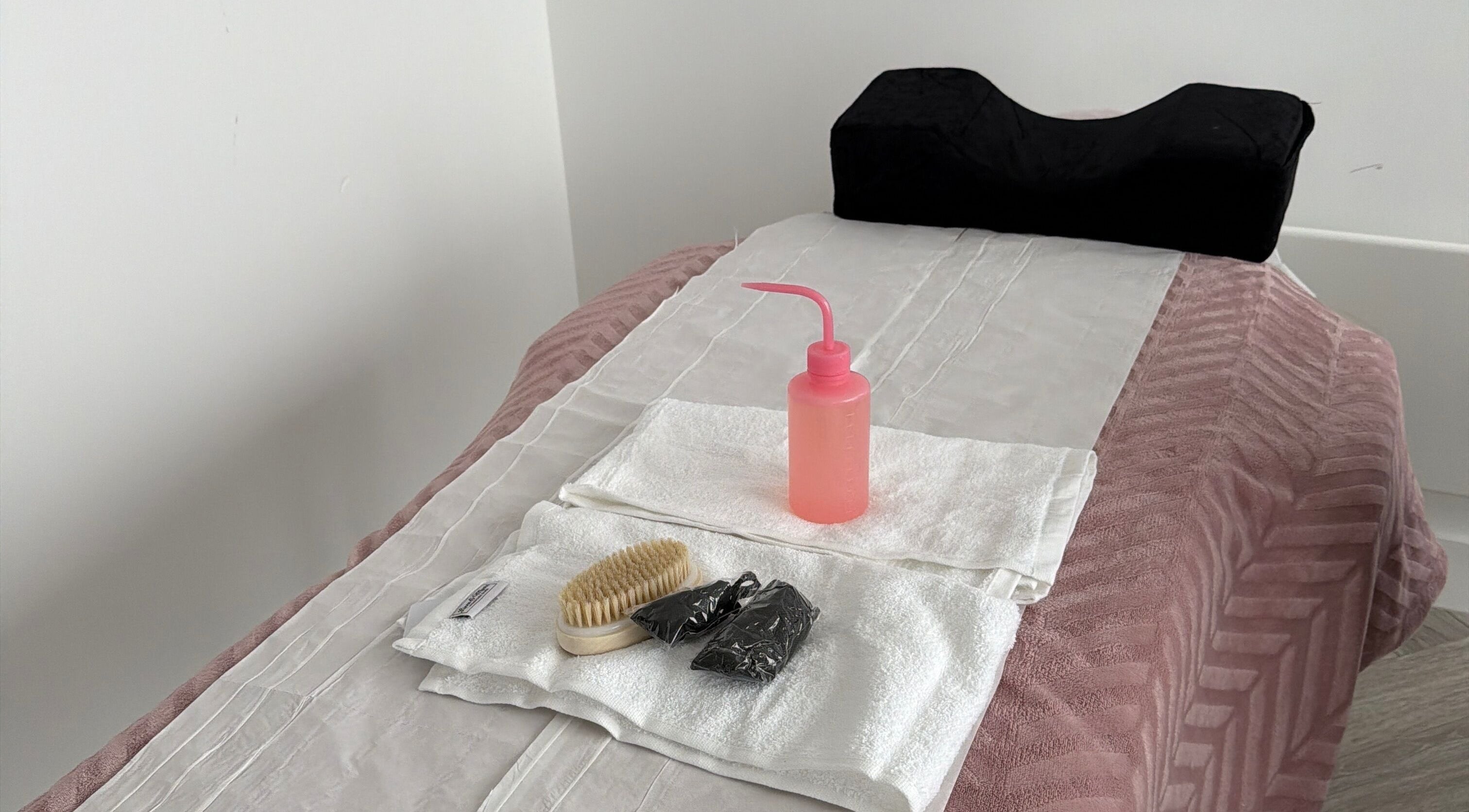 Treatment table setup at sol.lymphatic, Salford, England, GB, ready for a relaxing session.