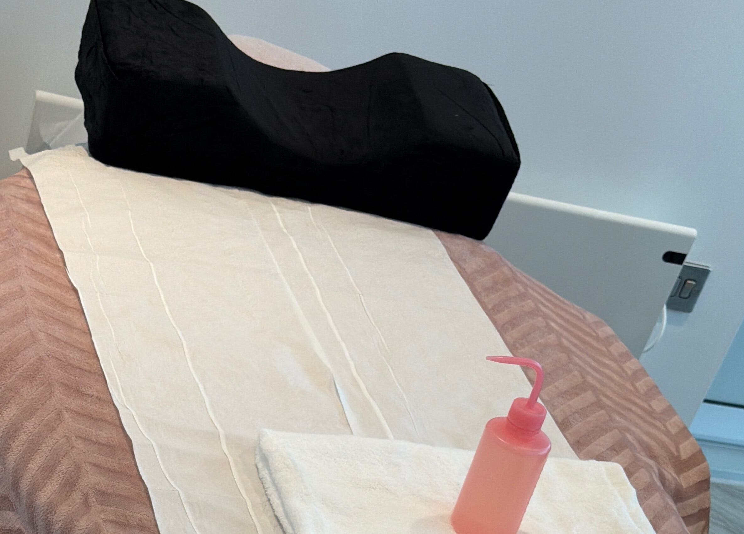 Comfortable treatment table at sol.lymphatic in Salford, England, GB ready for relaxation therapy.