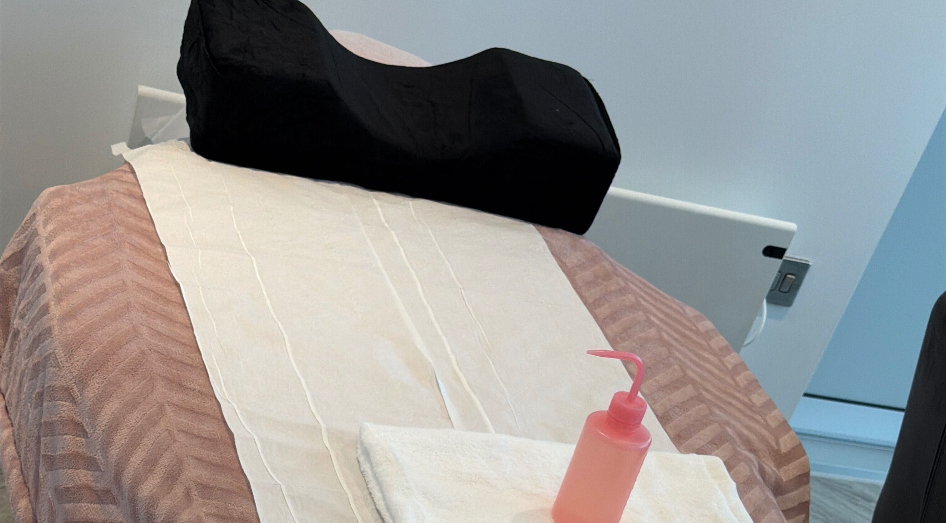 Comfortable treatment table at sol.lymphatic in Salford, England, GB ready for relaxation therapy.