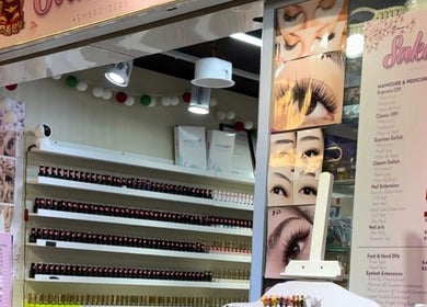 Interior of Sakura Nails showcasing nail polish display in Singapore, Singapore, SG.