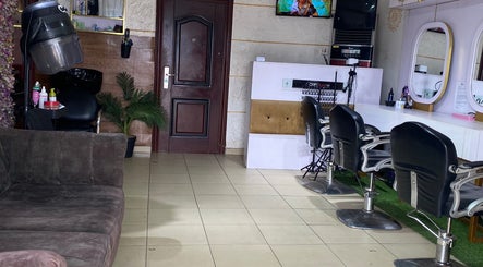 Interior of Kk’s Place Unisex Salon with styling chairs and decor, Port Harcourt, Rivers, NG.