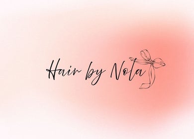 Elegant logo of Hair By Nola, Brighton And Hove, England, GB with subtle pink background.