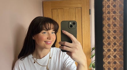 Visitor at Reconnect With Bri in Glenfield, England, GB taking a mirror selfie, showcasing serene ambiance.