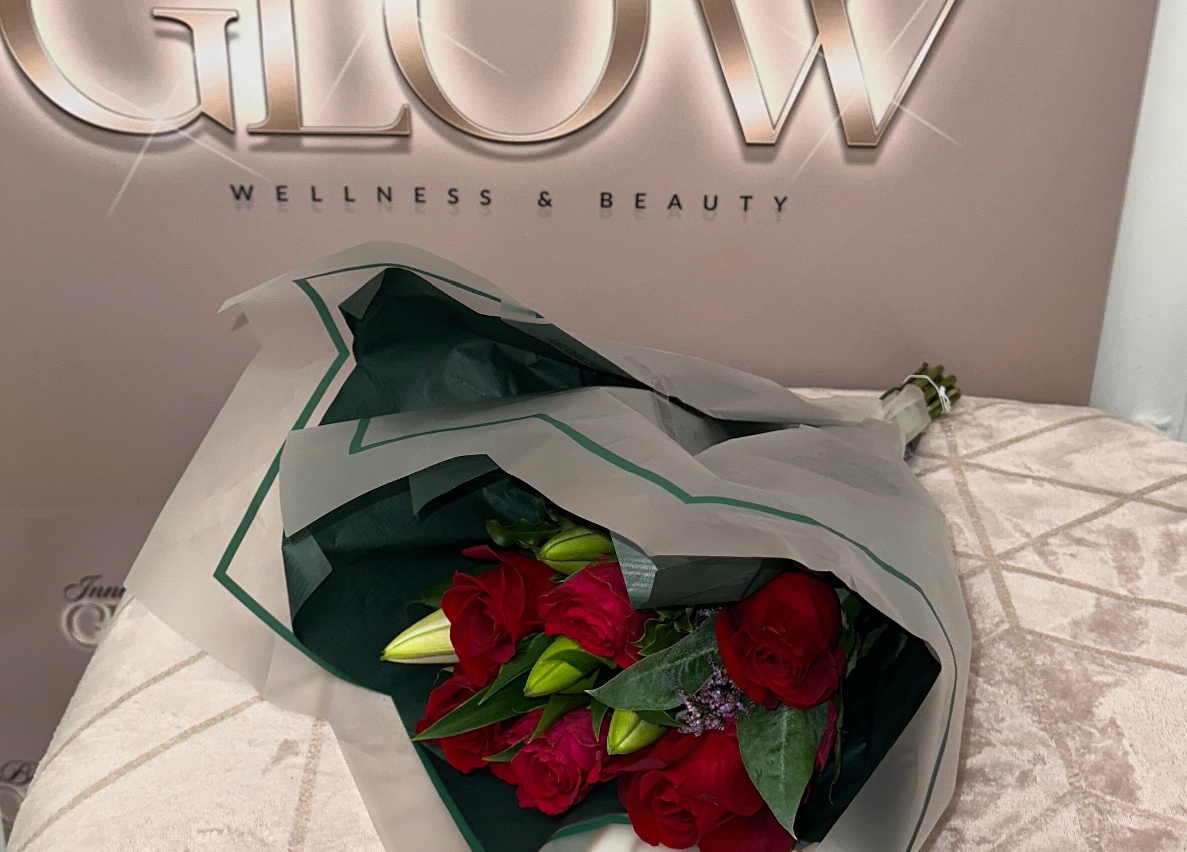 Bouquet of flowers on a table at Inner Beauty Glow, London, England, GB, showcasing a warm welcoming space.