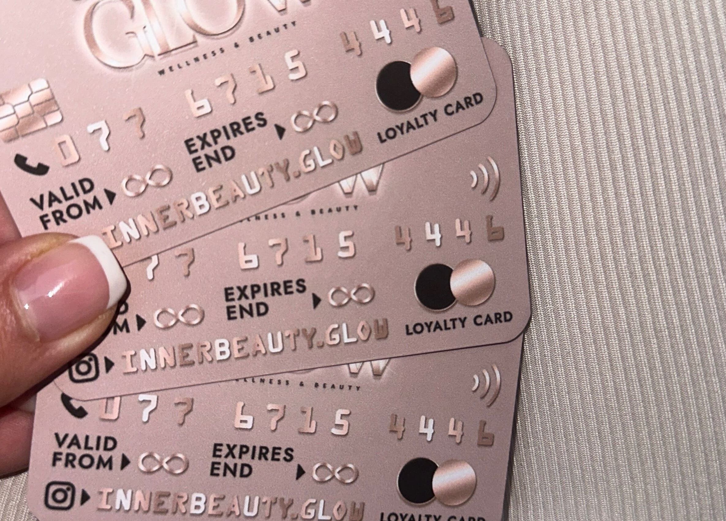 Inner Beauty Glow loyalty cards showcasing exclusive perks in London, England, GB.