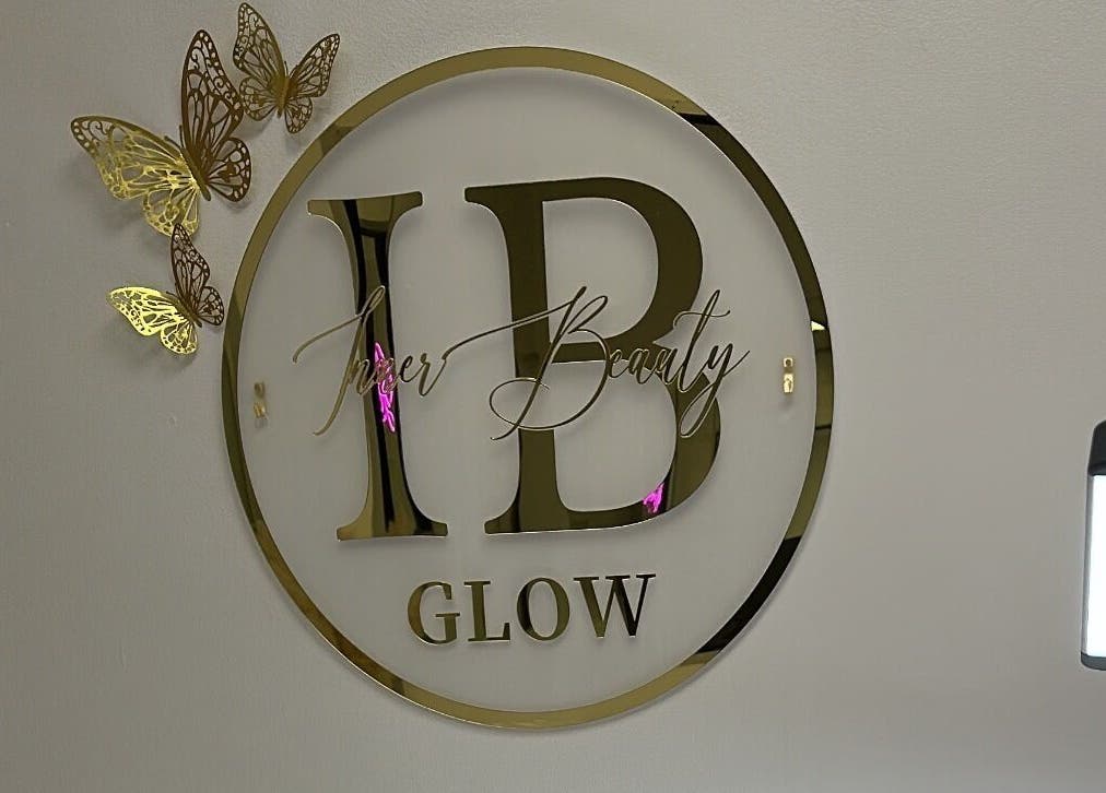 Golden butterflies and logo of Inner Beauty Glow located in London, England, GB.