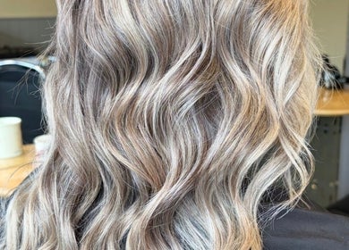 Blonde wavy hairstyle at Hair by Sienna, Northowram, England, GB.