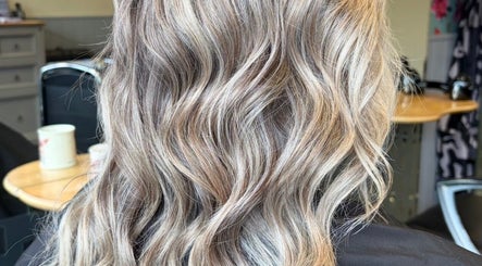 Blonde wavy hairstyle at Hair by Sienna, Northowram, England, GB.