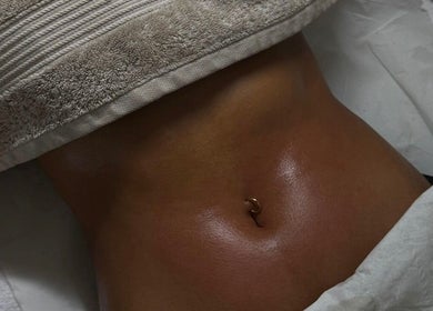 Relaxing spa treatment at JR Treatments, Horsham, England, GB, showcases a serene body massage setting.