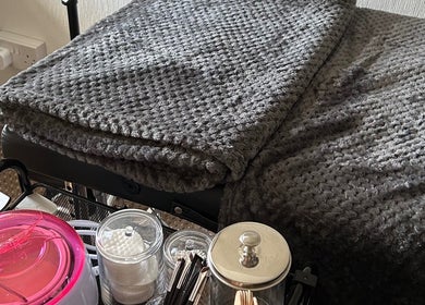 Treatment setup with plush blankets at Bliss Beauty by Chloe, Willenhall, England, GB.
